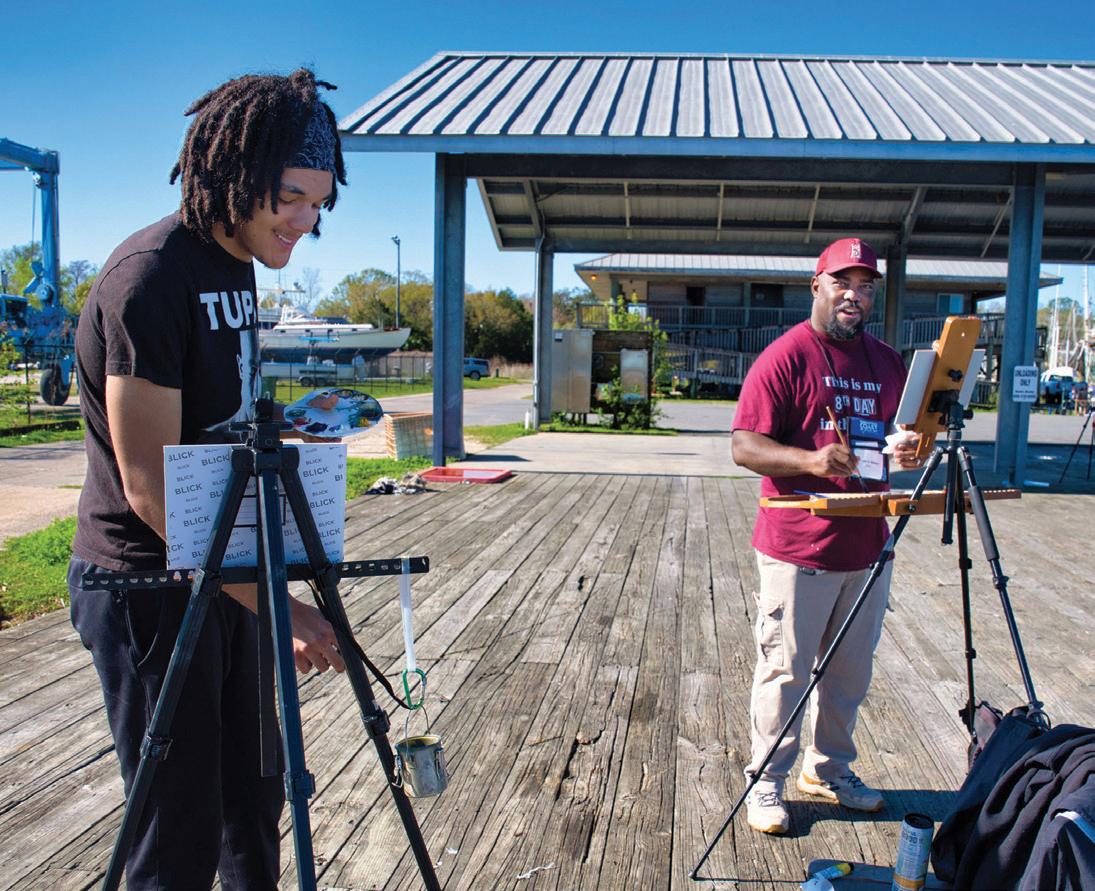 Steven Walker paints alongside a local student at this year’s Forgotten Coast en Plein Air, reflecting the spirit of mentorship and community outreach that defines today’s plein air events.