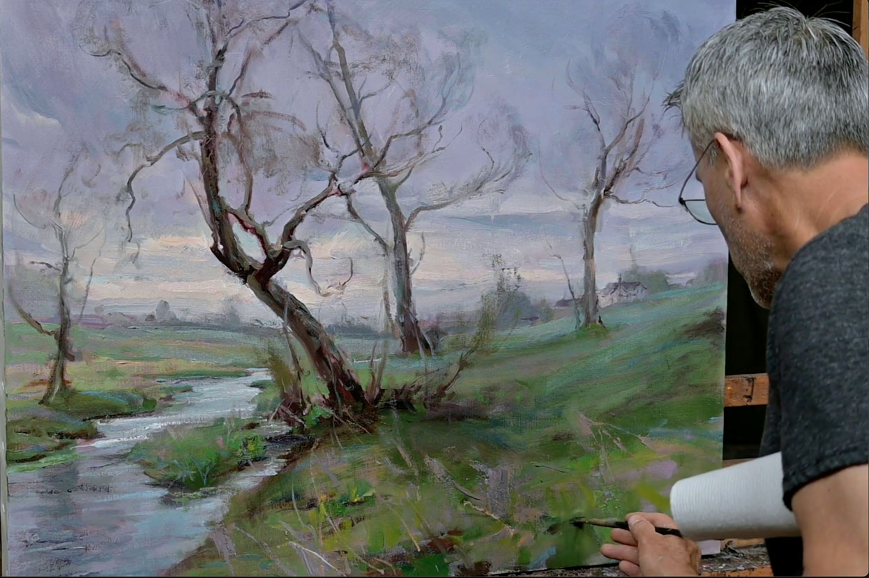 Daniel Gerhartz painting a landscape
