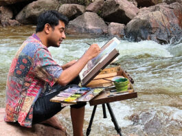 The artist painting on location