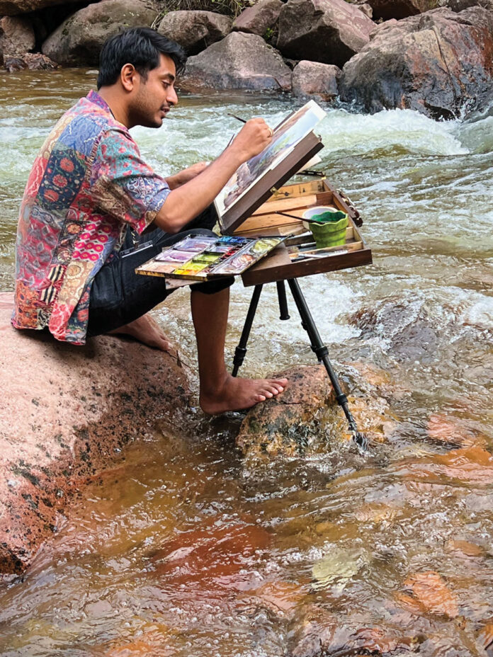 The artist painting on location The artist painting on location