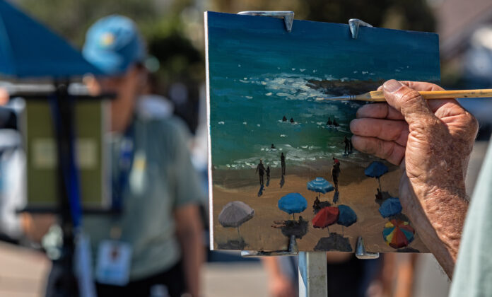 Laguna Plein Air Invitational Artist Carl Bretzke (Minneapolis, MN) captures a Laguna October beach scene during unseasonably high temperatures (Photo by LPAPA's Event Photographer Mitch Ridder). Laguna Plein Air Invitational Artist Carl Bretzke (Minneapolis, MN) captures a Laguna October beach scene during unseasonably high temperatures (Photo by LPAPA's Event Photographer Mitch Ridder).